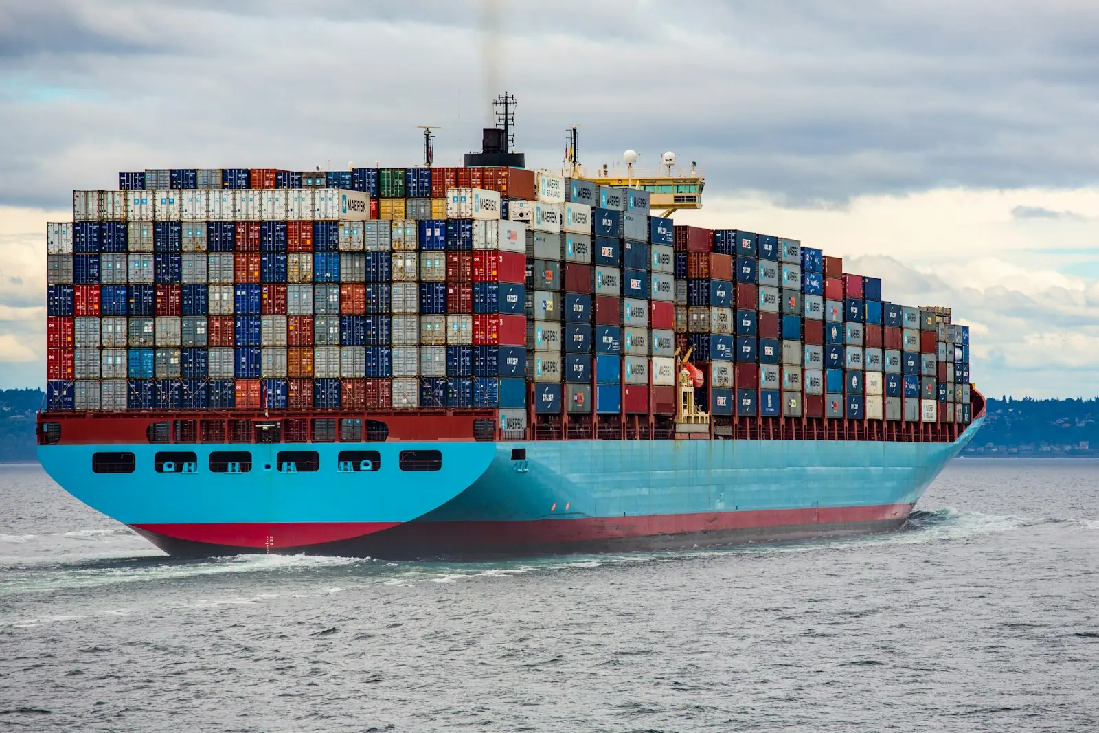 Illustrative container ship at a commercial port